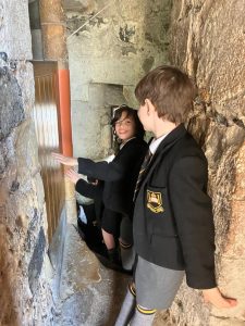 Children exploring water feature at Inchmarlo, a beautiful estate in Scotland.