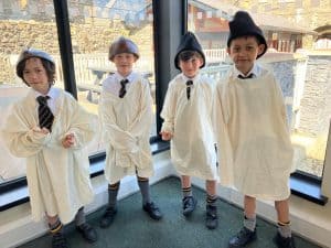 Group of children in school uniforms at Inchmarlo, showcasing Scottish education and heritage.