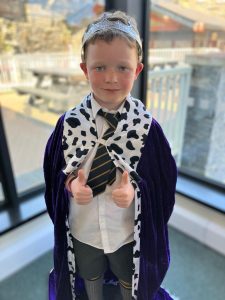 Young boy dressed as a wizard at Inchmarlo House, ready for a themed event.