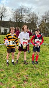 Young runners participating in a charity race at Inchmarlo estate.