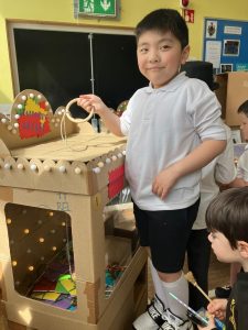 Child enjoying educational activity at Inchmarlo School.