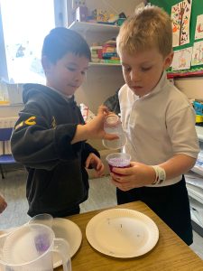 Two young boys engaging in arts and crafts at Inchmarlo School.
