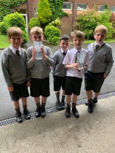 Young students in school uniform outdoors at Inchmarlo.