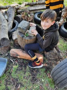 Children enjoying outdoor play and creative activities at Inchmarlo estate.
