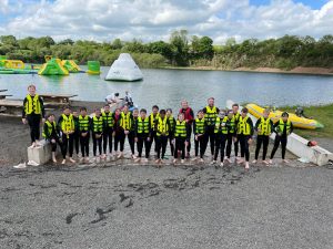 Group of children enjoying water activities at Inchmarlo, Aberdeenshire.