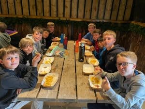 Children enjoying a meal at Inchmarlo, a family-friendly venue with cozy dining options.