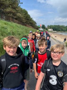 Children walking along seaside path at Inchmarlo.