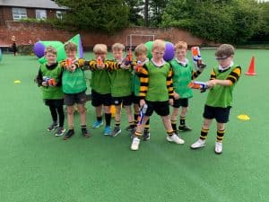 Children playing rugby at Inchmarlo outdoor sports field.