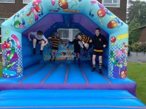 Colorful inflatable play zone at Inchmarlo with kids enjoying safe outdoor fun.