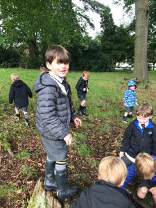 Children exploring nature at Inchmarlo outdoor activity park.