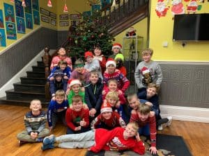 Children celebrating Christmas at Inchmarlo, festive holiday event at Inchmarlo with joyful kids and Christmas decorations.