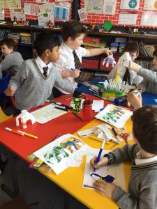 Children engaging in creative art activities at Inchmarlo School.