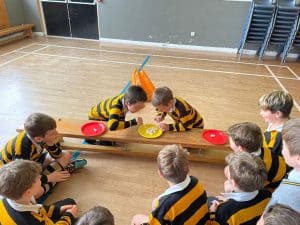 Children engaging in a fun science activity at Inchmarlo School.