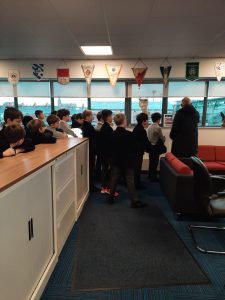 Children watching from a boat window at Inchmarlo.