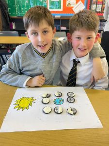 Two schoolboys enjoying learning activities at Inchmarlo School.