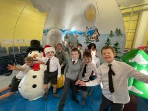 Children enjoying festive activities at Inchmarlo holiday club.