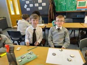 Students working together in a classroom setting at Inchmarlo School for engaging learning experiences.