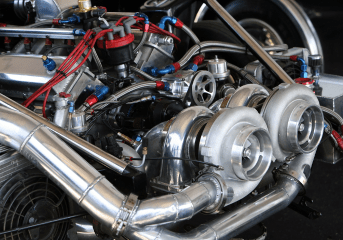 Turbocharger system with intercooler and piping for high-performance vehicles.