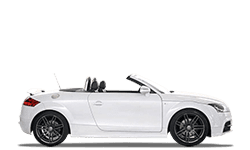 White convertible car parked outside Janex Auto Service shop.