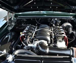Close-up of a clean, powerful car engine in a well-maintained vehicle.