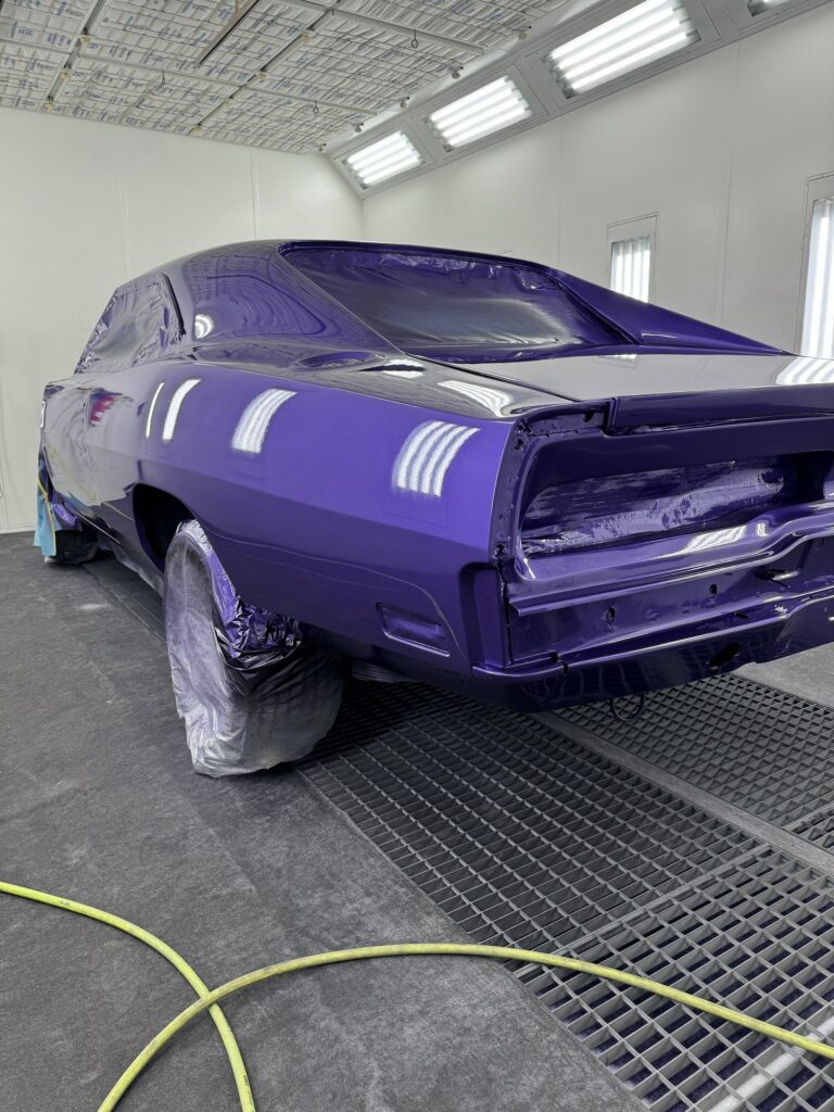 Classic car being restored at John's Automotive, expert auto body repair.