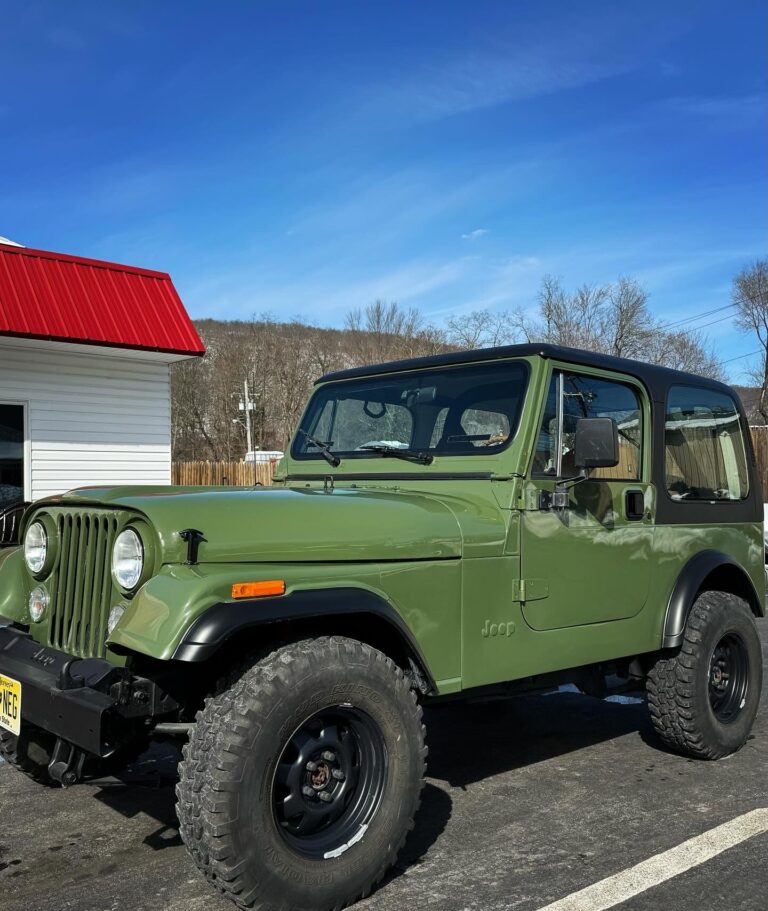 Vintage Jeep being restored at John's Auto Restorations.
