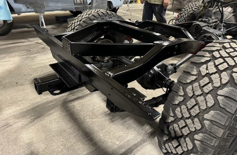 High-quality image of a truck chassis undergoing restoration, showcasing expert automotive repair an.