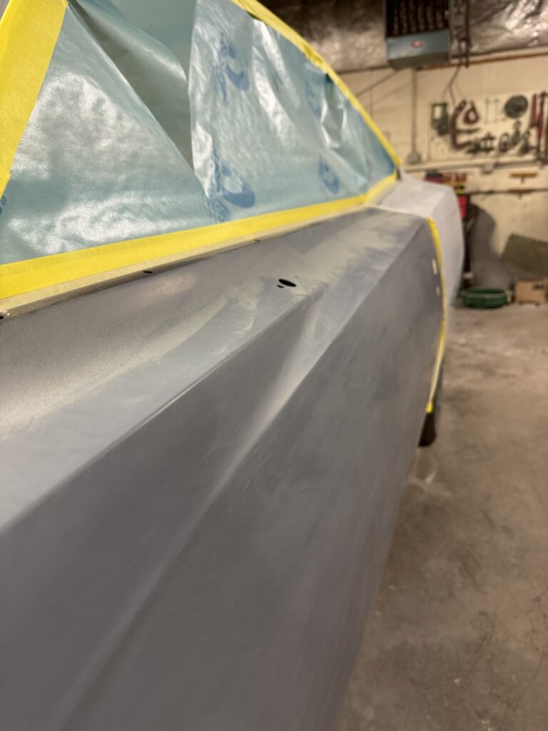 Auto body repair and restoration process at John's Automotive.