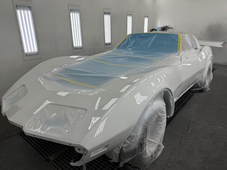 Classic car being painted at John's Auto Restorations.