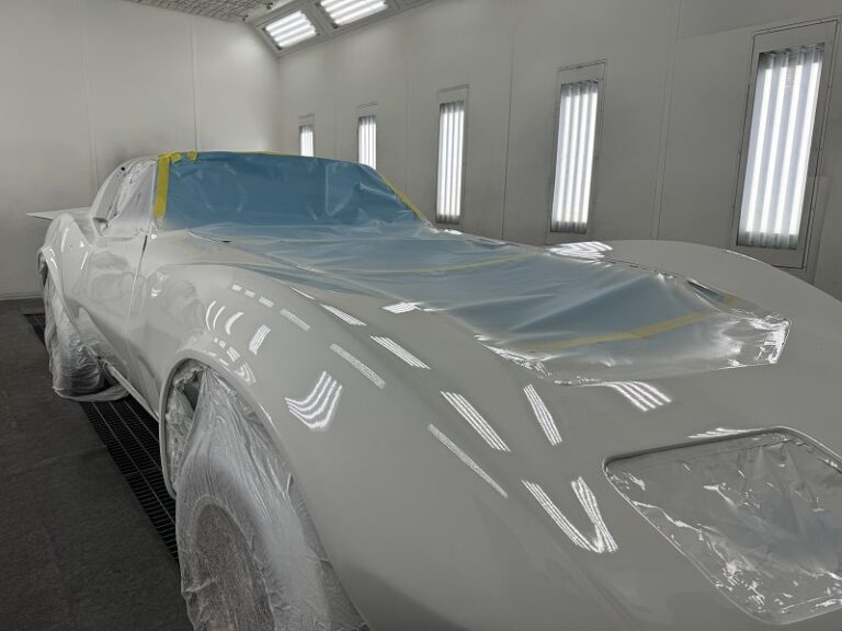 Classic car in restoration process at John's Automotive, expert auto body repair.