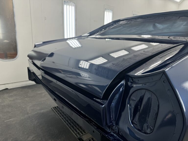 Expert car restoration services at John's Auto Shop, specializing in classic and modern vehicle repa.