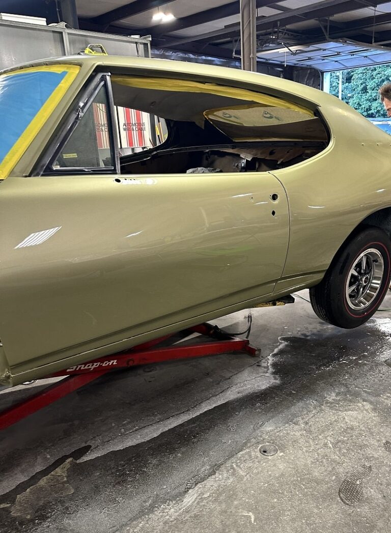 Classic car restoration, bodywork, and paint services for vintage vehicles.