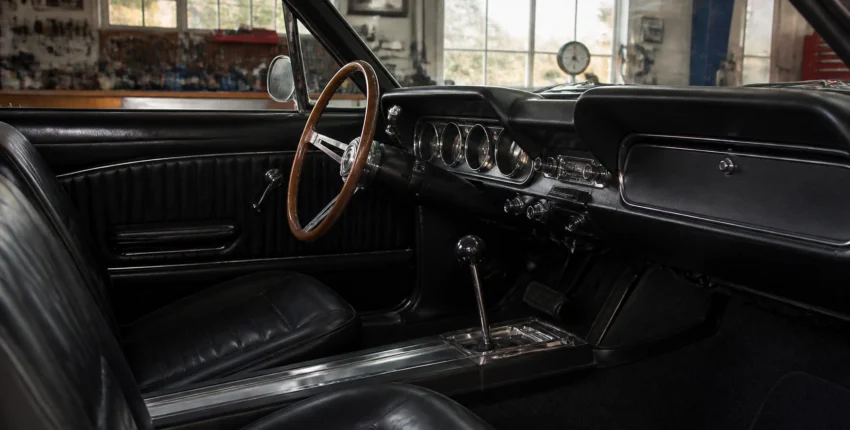 Interior of a restored vintage car at John's Auto Restoration.