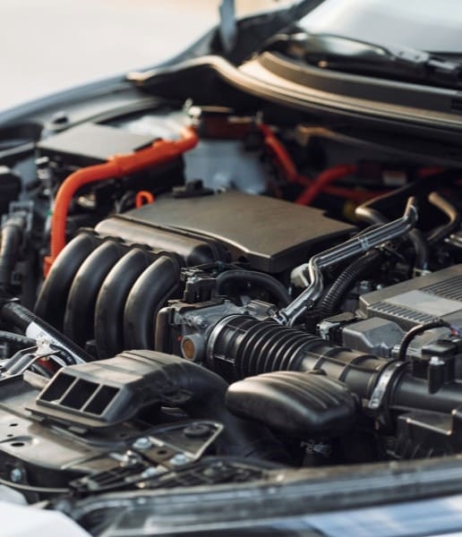 Close-up of a car engine at Kabayan Auto Repair LTD.