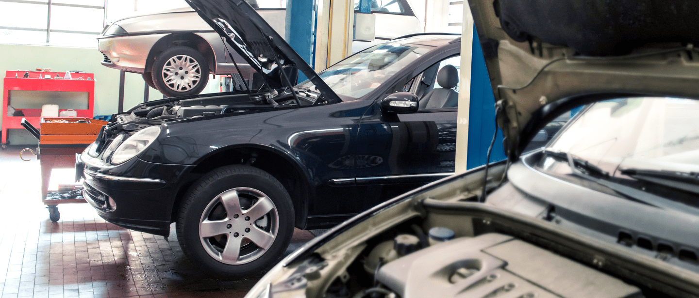 Car undergoing maintenance and repair at Kerrigan's Automotive shop.