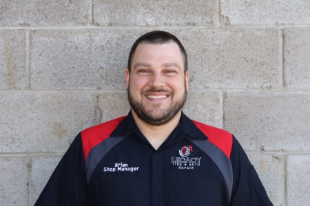 Friendly auto repair technician at Legacy Tire & Auto Repair.