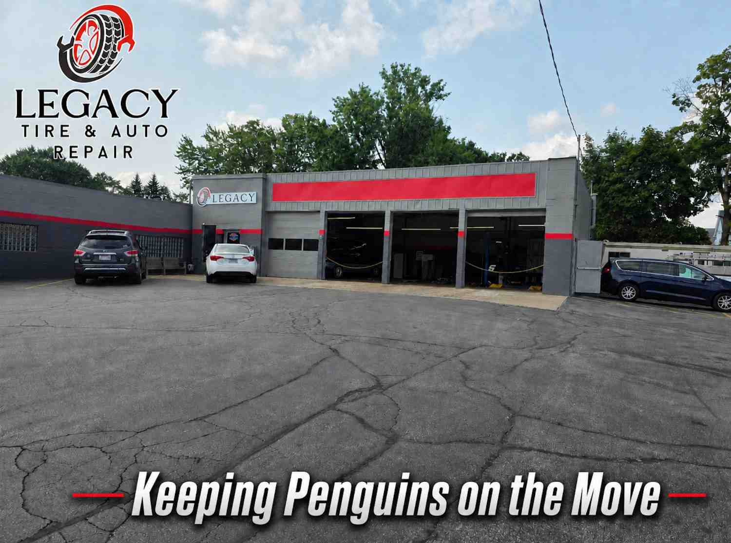 Auto repair shop with vehicles and open bays at Legacy Tire & Auto Repair.
