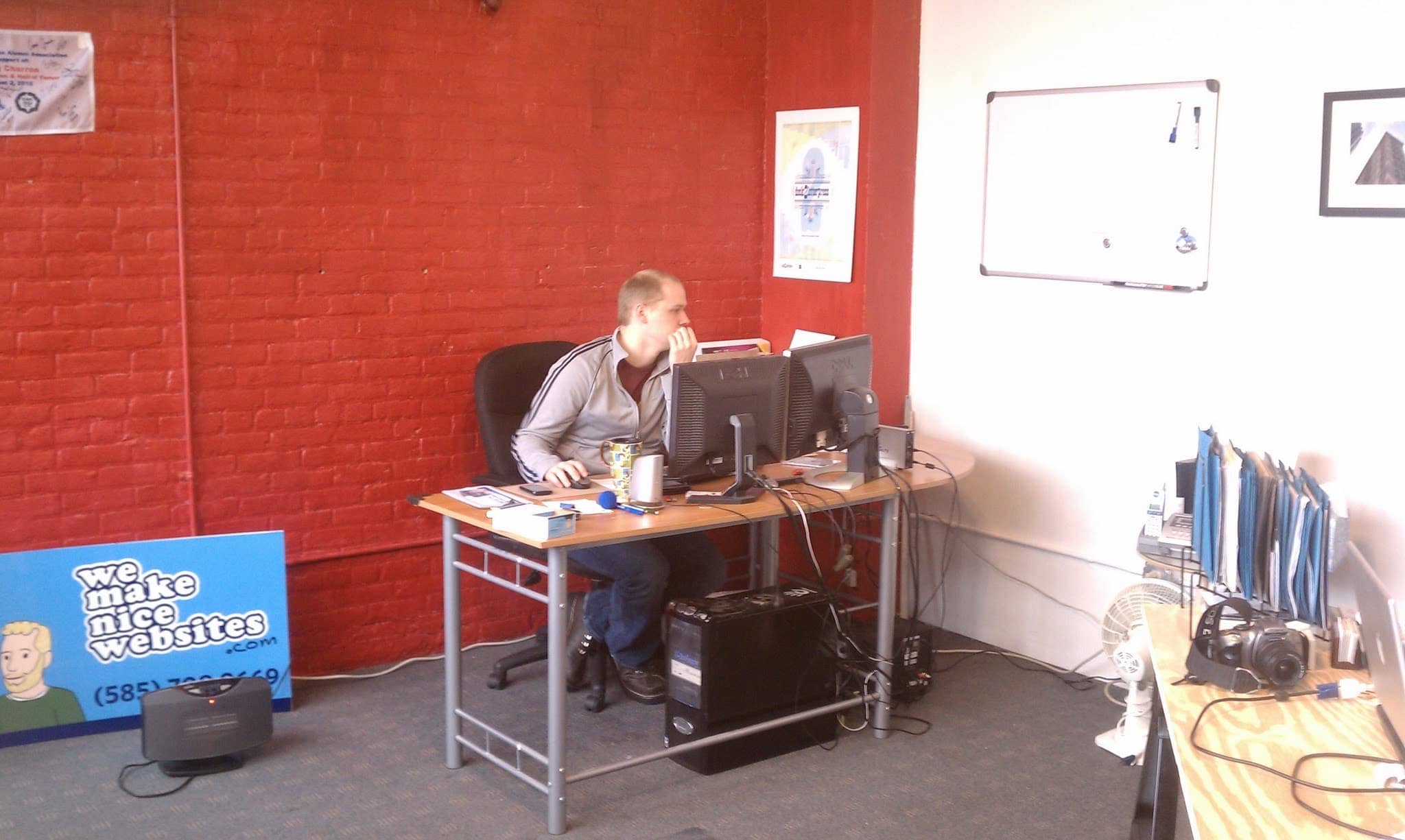 Josh working at desk in office