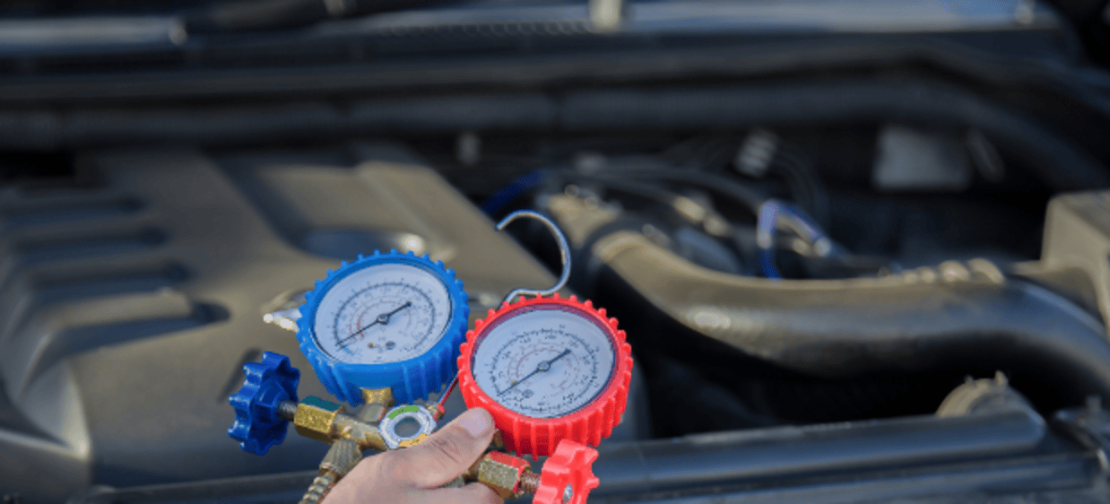 Emissions testing gauges used by Masonic Smog & Repair for vehicle inspection and repair services.