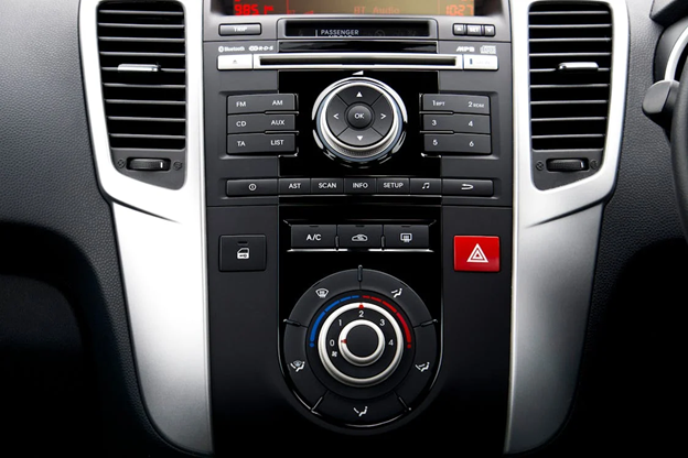 Car climate control panel showing AC and temperature settings.