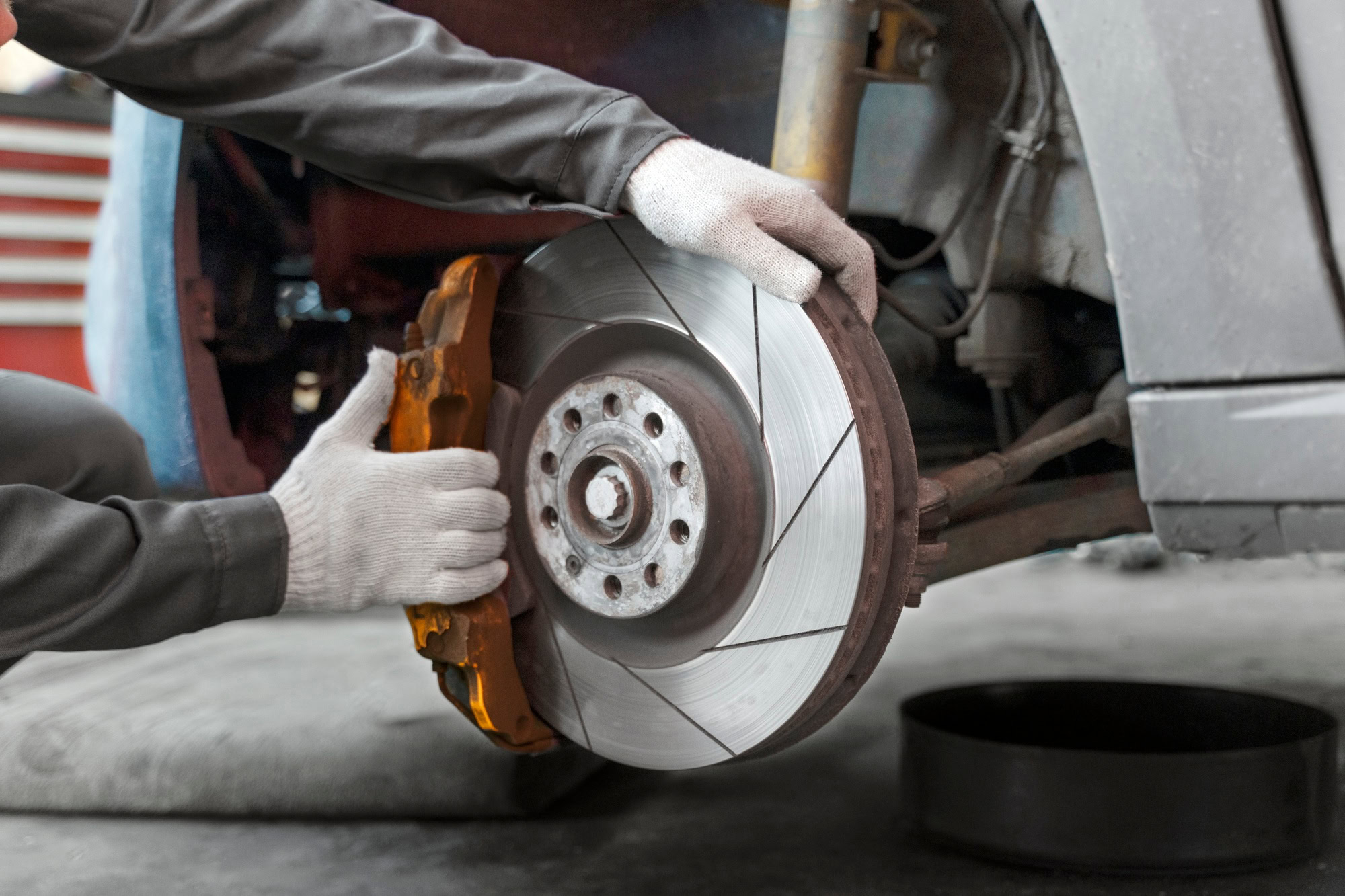 Professional brake rotor replacement at Masonic Smog & Repair.