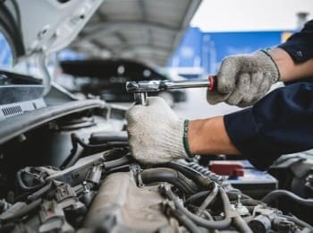 Engine repair service at Mazda Pros Inc. Expert technicians diagnosing and fixing vehicle engines ef.