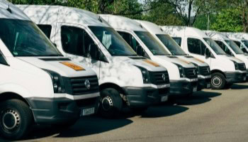 Fleet of maintenance vans at Mécanique E.G.L. for reliable vehicle repair and servicing.