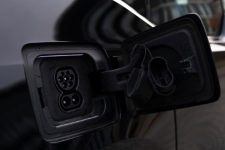 Electric vehicle charging port for EVs at Mécanique E.G.L.