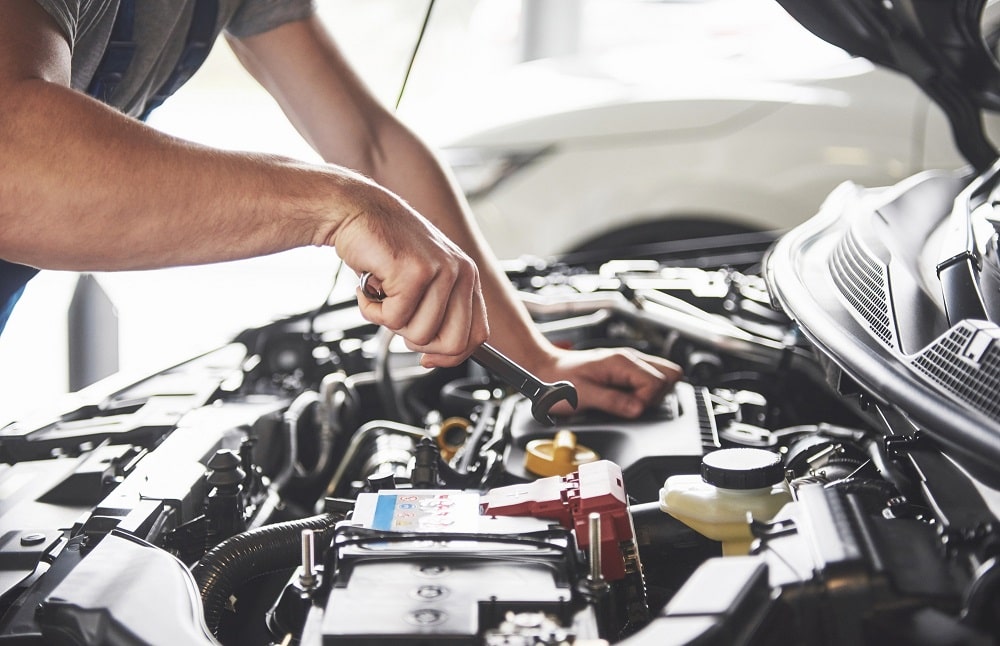 Auto engine checkup and oil change at Mickey's Automotive, Inc.