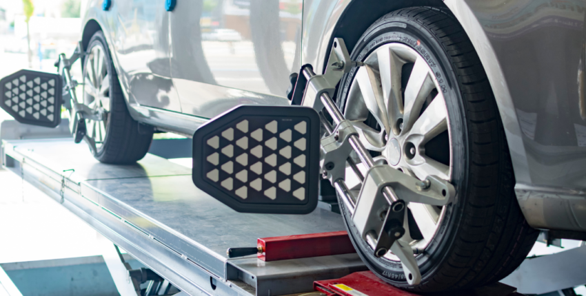 Wheel alignment service for cars at MJZ Garage, improving handling and tire longevity.