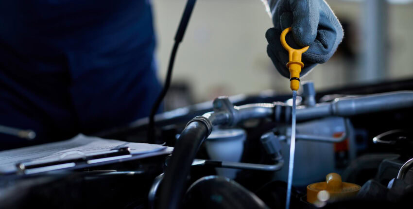 Engine oil check and maintenance at MJZ Garage, trusted auto repair shop.