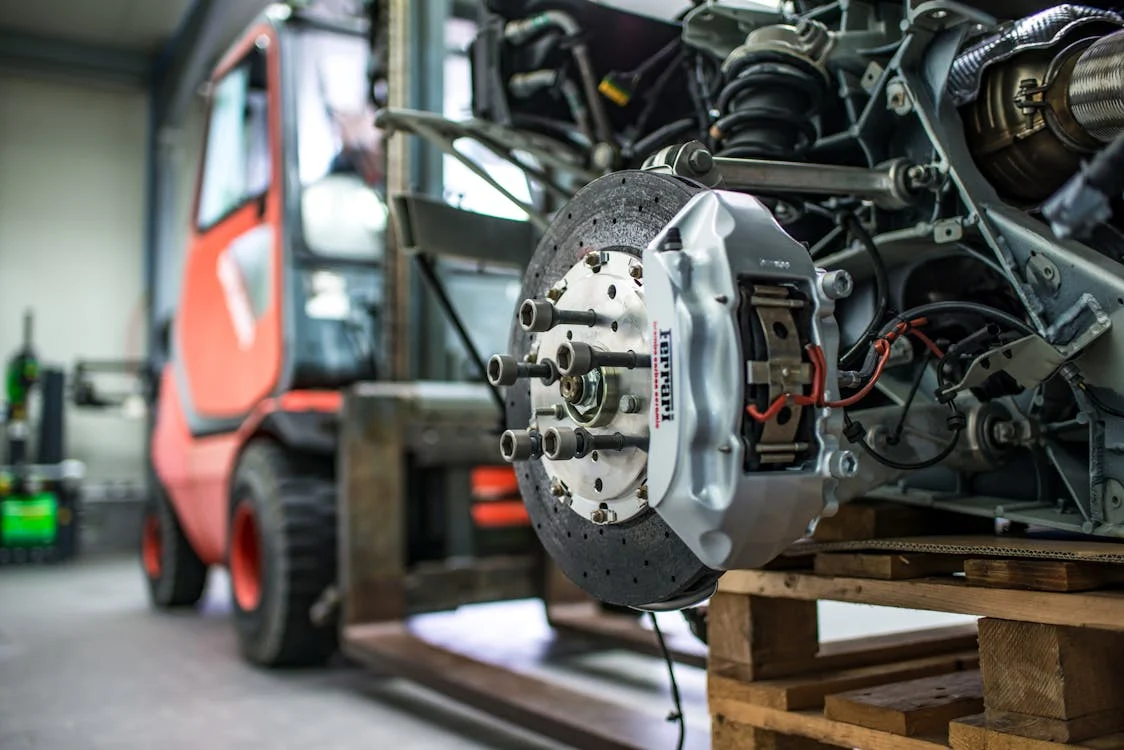 Engine component being serviced at Mobile Man Auto Repair.
