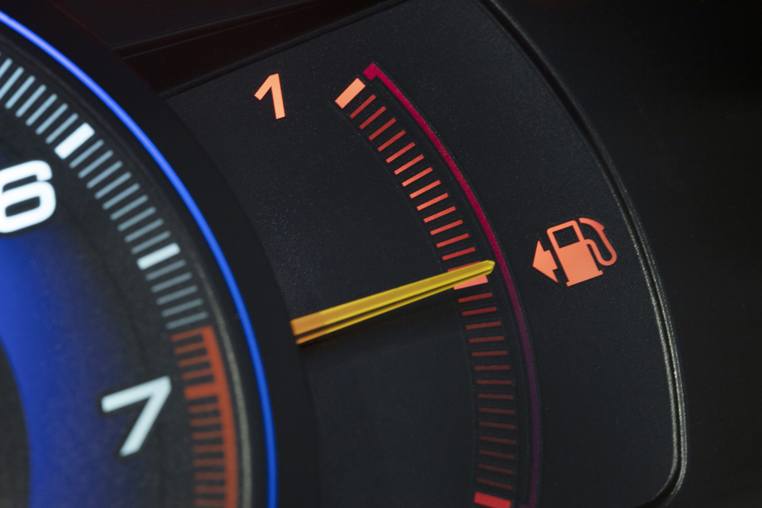 Car dashboard with illuminated check engine warning light in Sioux Falls, SD.