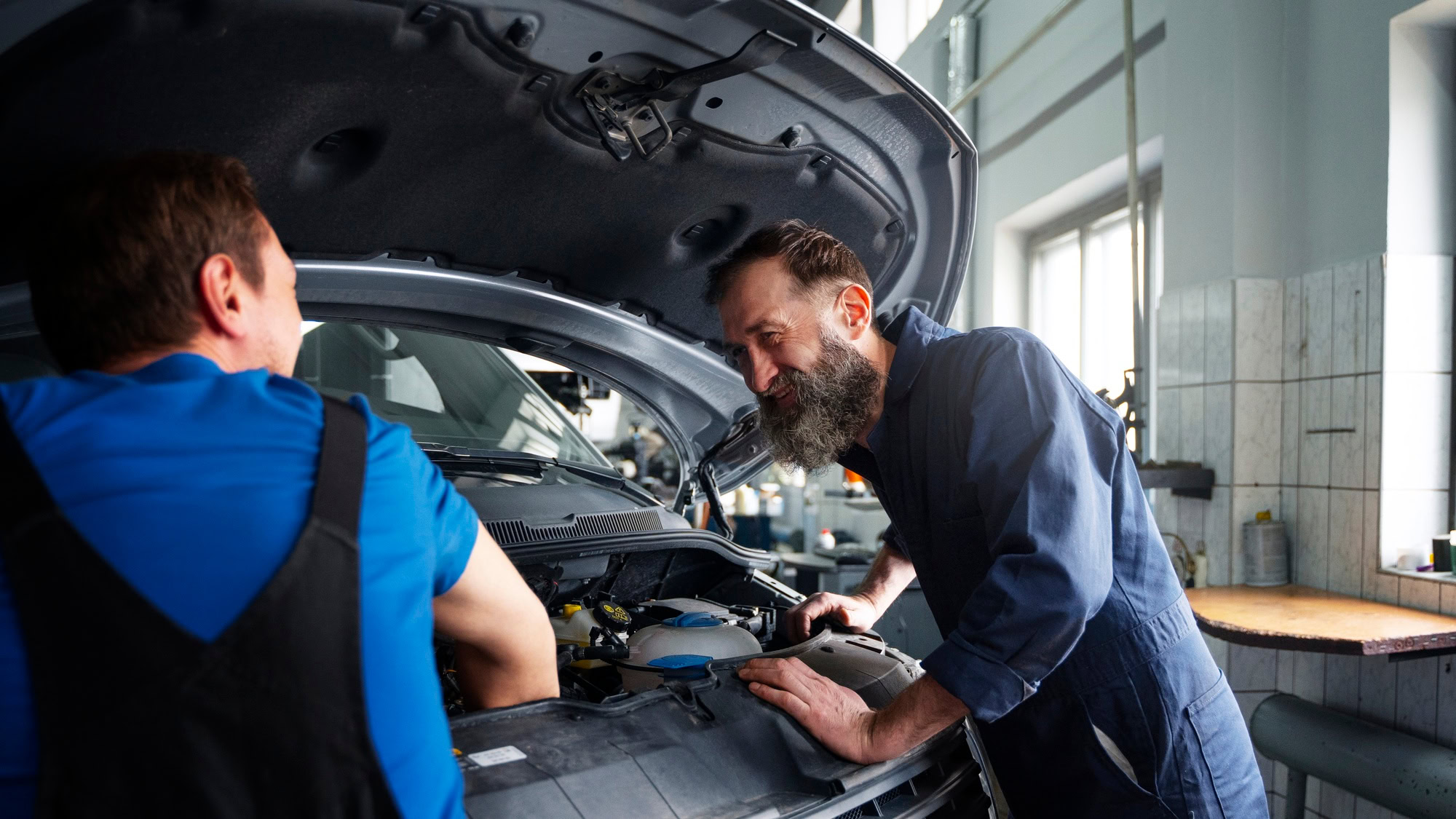 Mechanics discussing engine issues